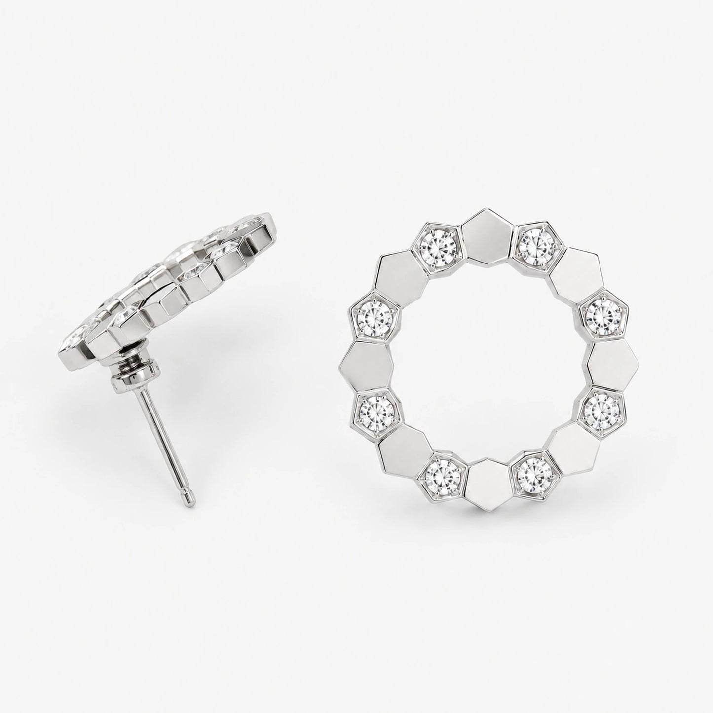 Front and side construction views of geometric open circle stud earrings
