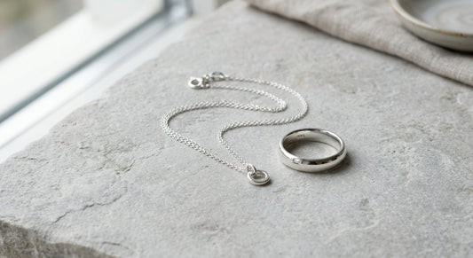 Elegant 925 sterling silver jewelry displayed on a neutral surface