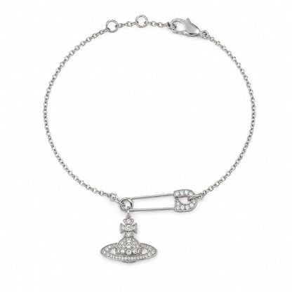 Silver-tone safety pin orb charm bracelet on a white background.