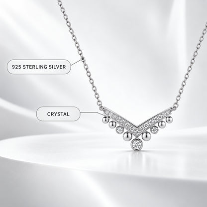 925 sterling silver and crystal material details of a chevron drop necklace.