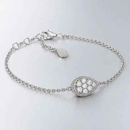 Shallow side-angle view of the silver crystal teardrop bracelet and fine chain.