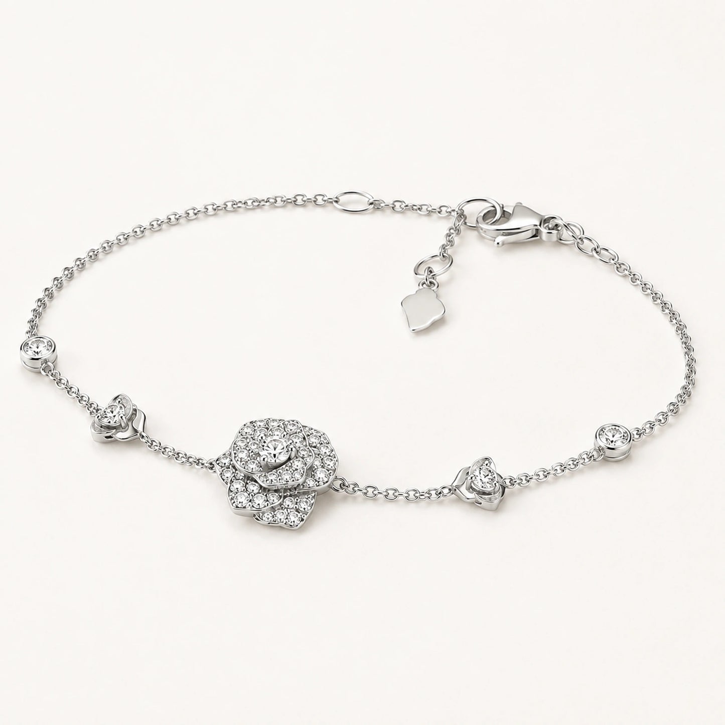 Oblique view of crystal rose bracelet showing raised flower and clasp construction