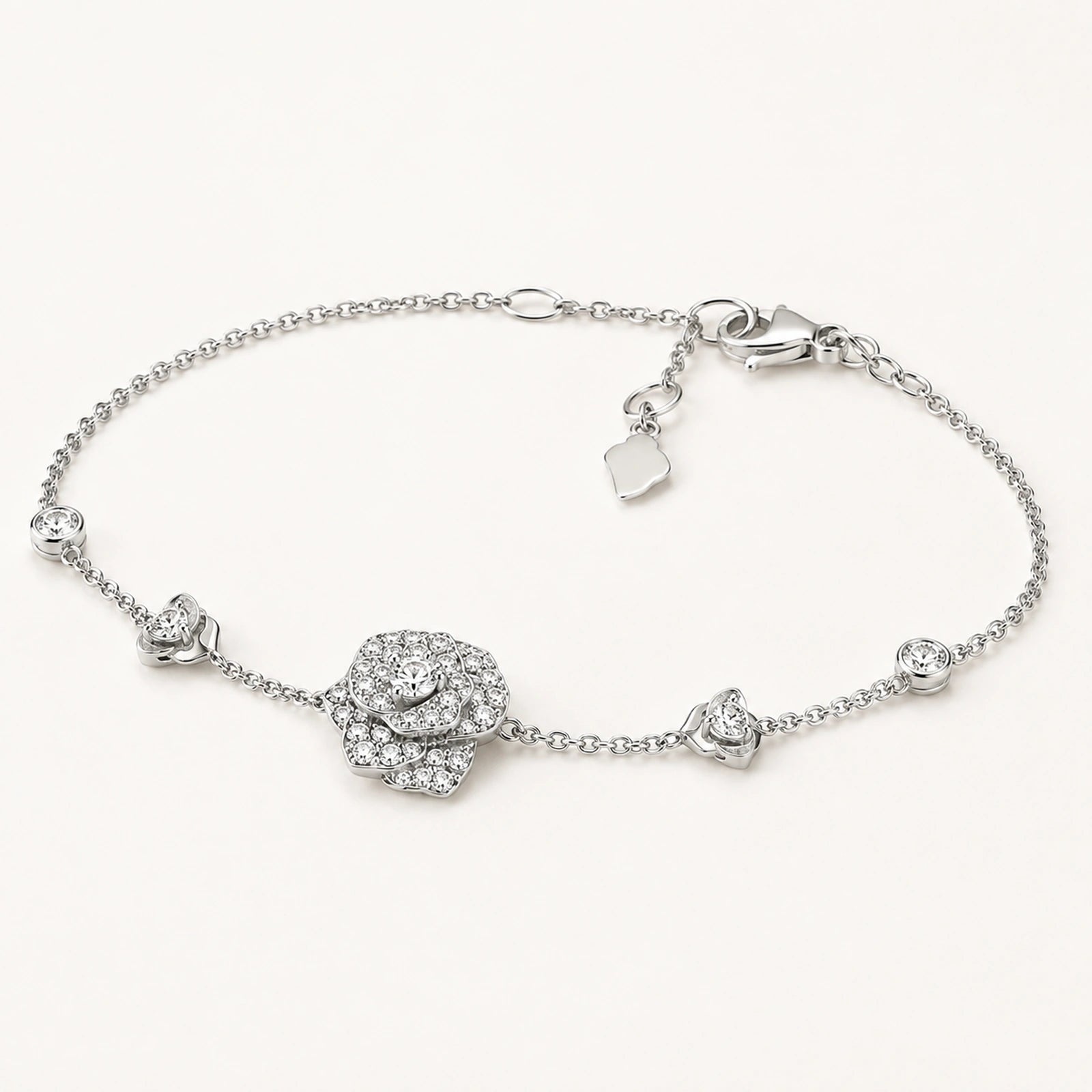 Oblique view of crystal rose bracelet showing raised flower and clasp construction