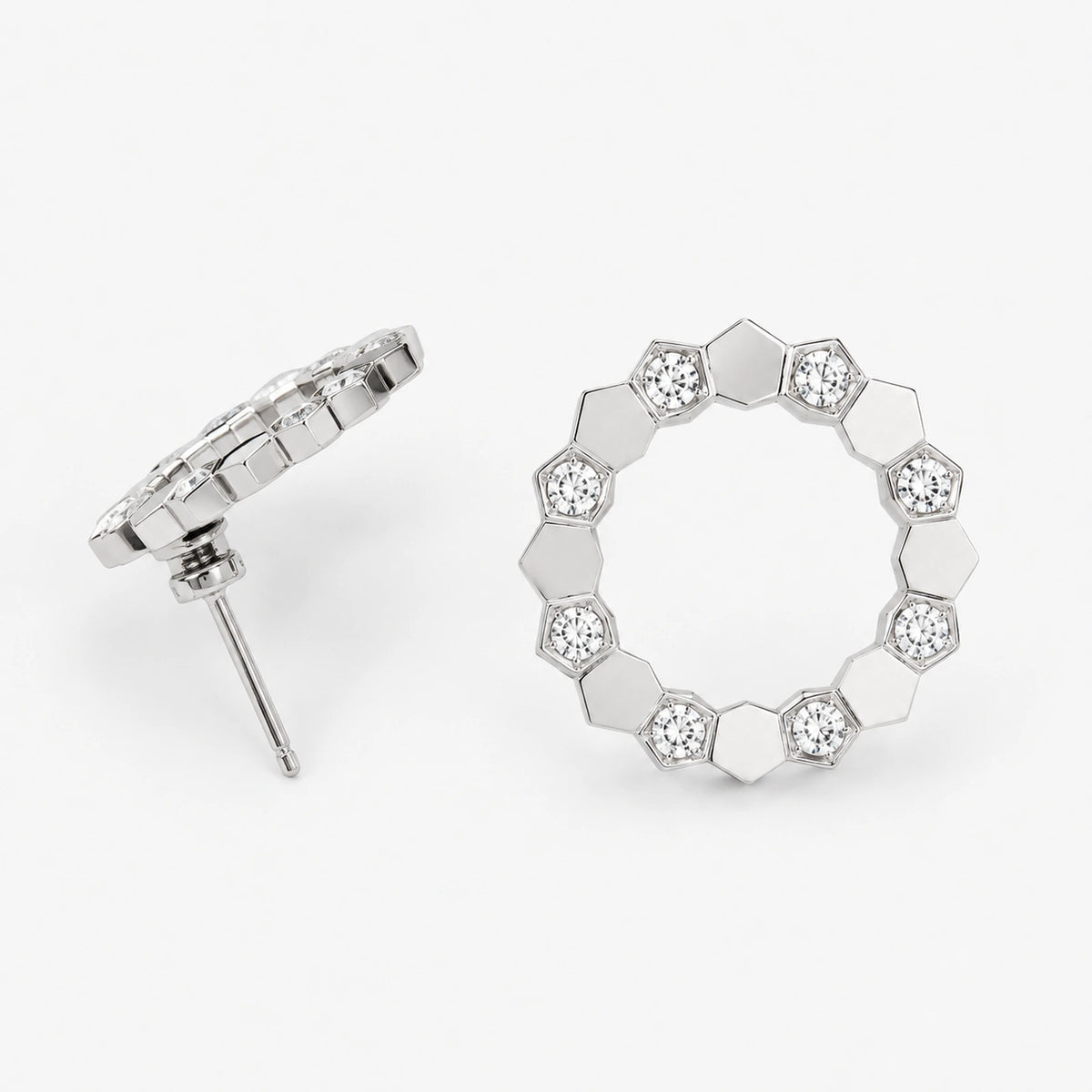 Front and side construction views of geometric open circle stud earrings